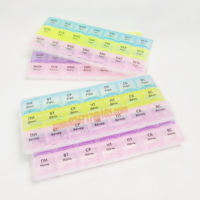 Style portugais 7 jours pilule boîte de rangement en plastique 28 cas hebdomadaire en plastique pilulier 28 compartiments en plastique pilulier