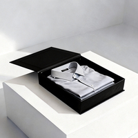Boîte à T-shirt en carton rigide de style livre noir, écologique et personnalisée, avec logo en or estampé à chaud et fermeture magnétique