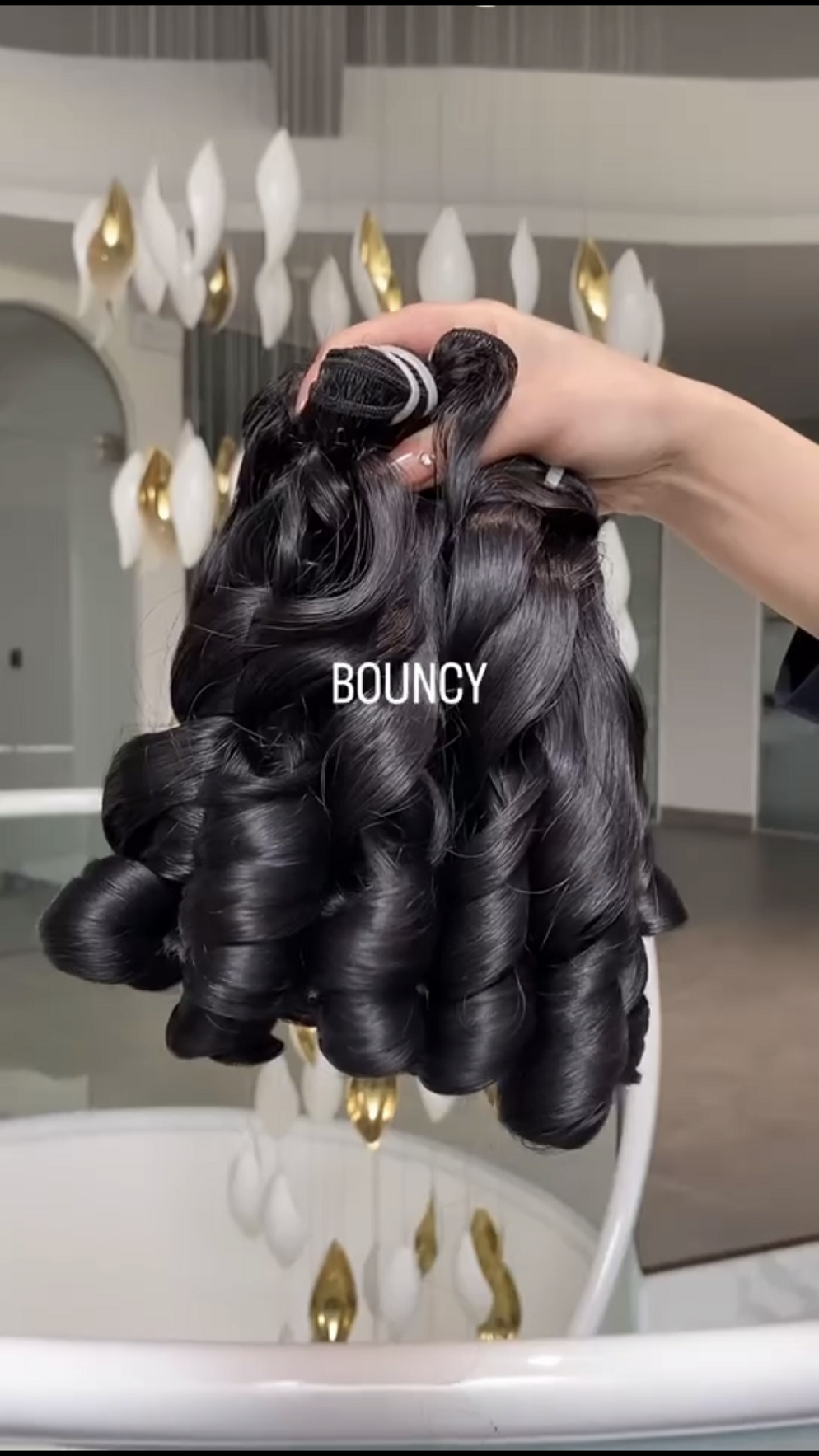 1 paquet rebondissant bouclé