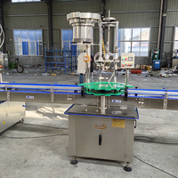 Machine de remplissage de liquide de bouteille entièrement automatique Machine d'embouteillage de vin de whisky Machine de remplissage de vin de liqueur de vodka de spiritueux