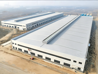 Hangar agricole préfabriqué en acier moderne, durable, anti-corrosion et coupe-vent pour le stationnement de tracteurs, le stockage de foin et l'entreposage d'équipements miniers