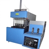Machine de soufflage semi-automatique à deux postes 4c2L, modèle 666, pour bouteilles d'eau minérale et de boissons en PET, garantie 5 ans