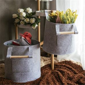 Cesta de almacenamiento de fieltro redonda de gran capacidad, con asas de madera para almacenar todo tipo de artículos diversos - Product Image 6