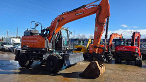 Excavatrice sur pneus d'occasion Doosan DX165W DX165 de 16 tonnes avec moteur Heli, pompe, PLC, roulement et godet de terrassement - Product Image 3