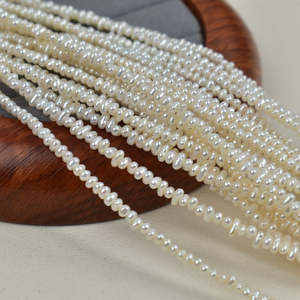 ลูกปัดน้ำจืดสีขาวธรรมชาติ ยี่ห้อ WENCHI รุ่น 1221 ขนาด 2-3 มม. รูปทรงไม่สม่ำเสมอ สำหรับงาน DIY เครื่องประดับทำมือ จำหน่ายแบบขายส่ง - Product Image 1