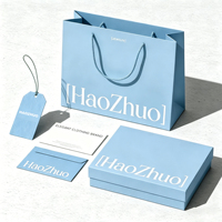 Ensemble d'emballages de luxe en papier personnalisés avec logo de marque professionnelle, boîte cadeau durable, sac de shopping, étiquette pour marques internationales