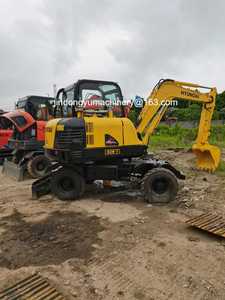 Excavatrice sur pneus Hyundai 60W-7 d'occasion avec moteur et pompe, garantie 1 an pour les machines de construction - Product Image 2