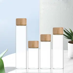 <span class=keywords><strong>30MM</strong></span> Tube en verre à haute teneur en Borosilicate 70ml 80ml 90ml conteneurs de stockage bouteilles en verre Tubes à essai avec couvercle en bambou - Product Image 1