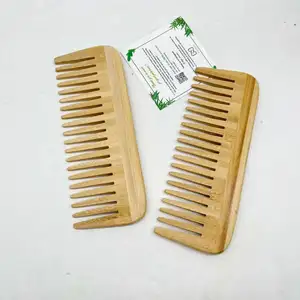 Pettine di legno di bambù fatto a mano ecologico economico all'ingrosso del pettine del dente largo antistatico di Logo su ordinazione