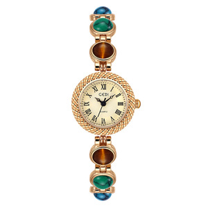 Montre à quartz vintage de luxe pour femme ALICE INT, cadran en œil de chat, bracelet en alliage, fermoir à bouton-poussoir caché, étanche 3 BAR, aiguille - Product Image 1