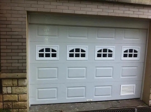 Portes sectionnelles automatiques isolées en mousse de PU Portes de garage à panneau sandwich en acier Vente à chaud en usine - Product Image 3