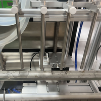 Nouvelle machine de capsulage de remplissage de liquide à têtes multiples entièrement automatique pour la production de vin à l'huile essentielle pour les industries chimiques du tabac