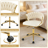 Fauteuil de bureau pivotant en velours, avec dossier tissé tufté à la main et base chromée dorée, idéal pour salon de beauté, bureau ou coiffeuse.