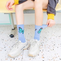 Chaussettes en coton de luxe pour femmes, nouveau motif papillon, respirantes, mi-tube, printemps, tendance, tricotées, écologiques, pour un usage quotidien, vente en gros