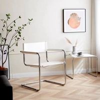 Fauteuil minimaliste de style nordique, chaise incurvée en tube d'acier inoxydable, chaise de salle à manger en similicuir