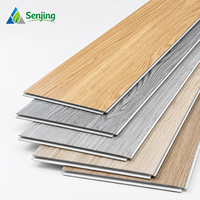 Revêtement de sol en vinyle LVT imperméable de luxe à prix bas, dalles à clipser, planches de bois SPC, design européen moderne, utilisation en intérieur