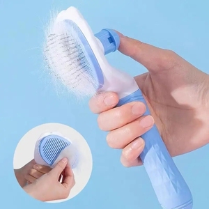 Cartone animato di lusso semplice Design automatico autopulente Pet <span class=keywords><strong>toelettatura</strong></span> spazzola cane e gatto pettine per rimuovere i peli