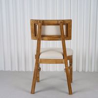 Chaise Louis moderne en bois d'hévéa avec dossier rembourré et design KD pour événements intérieurs/extérieurs, mariages et banquets