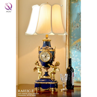 Horloge de siège de luxe en laiton européen Céramique Poupée ange en cuivre pur Boutique Ornement néoclassique Horloge de table pour porche de salon