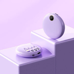 Nuevo diseño 10000mAh Banco de energía portátil Mini círculo redondo con cable incorporado EE. UU. Tipo de enchufe Estación de energía para teléfono - Product Image 3