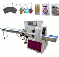 Machine d'emballage horizontale pour cartes parfumées désodorisantes de voiture, type flow pack