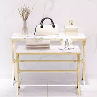 Table de présentation moderne haut de gamme en acier inoxydable personnalisable pour boutique de vêtements, exposition de vêtements, avec montage facile