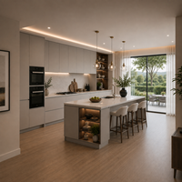 Meubles de cuisine laqués avec façades grises mates, niches en bois fumé et îlot central avec sièges