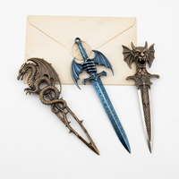 Couteau dague gothique antique en métal moulé, laiton doré et noir, de luxe haut de gamme, artistique et unique, ouvre-lettres