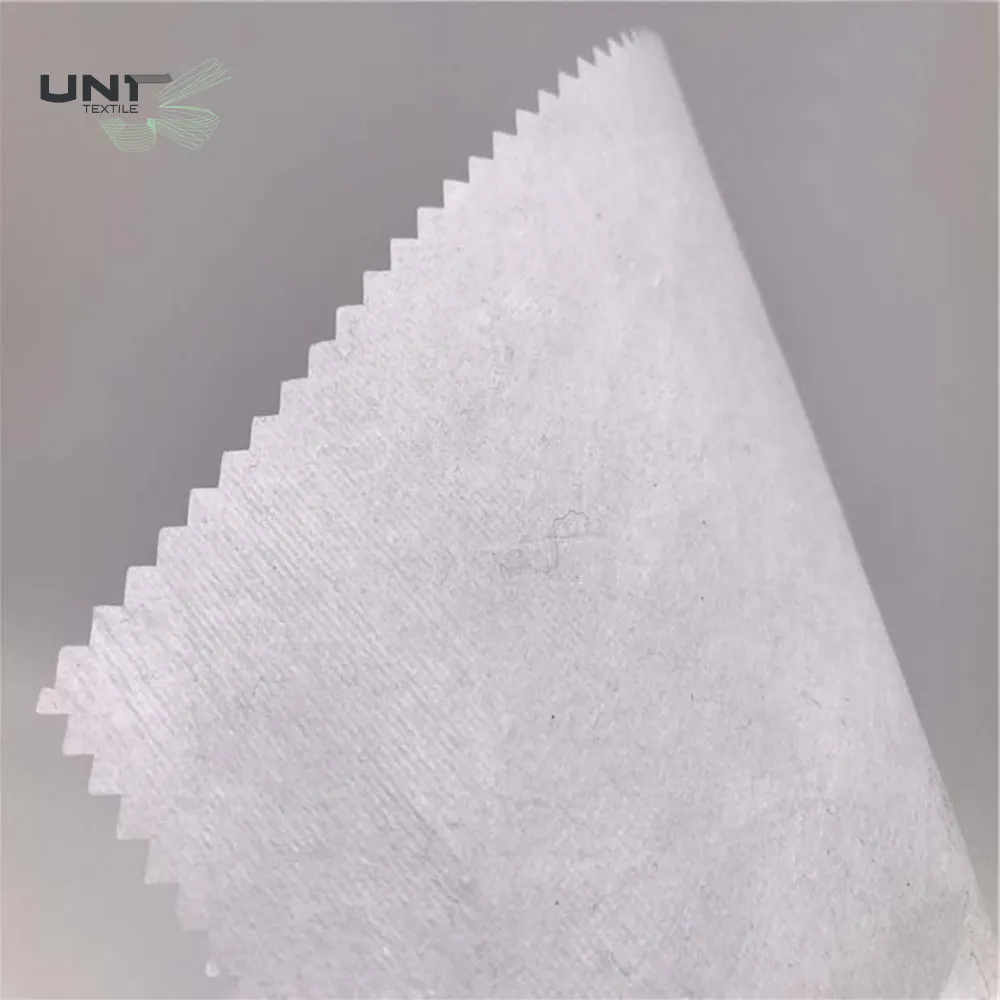 Hot sell 100% cotton embroidery backing paper easy tearaway non woven fabric for fashion dress and other garment