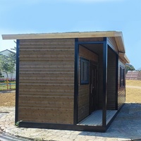 Maison conteneur préfabriquée personnalisable en panneaux sandwich, motif bois, résistante au feu, cabane modulaire moderne pour maison d'hôtes panoramique en parc