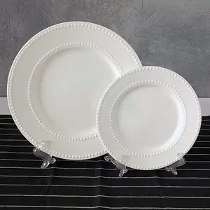 Wholesale embossed ceramic dinner plate elegant charger plates for wedding white ceramic beaded plates