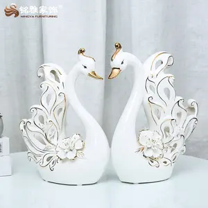 Wedding gift porcelain small white swan statue home decoration hollow carved ceramic sculpture