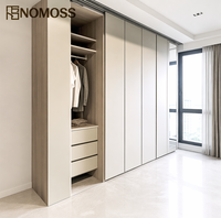 Armoire en bois sur mesure élégante avec rangement flexible pour vêtements, idéale pour les chambres de luxe, les villas et les projets de mobilier résidentiel