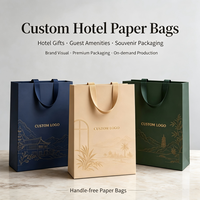 Sac cadeau en papier de luxe personnalisé avec poignée en ruban, sans pli central, sac en papier avec logo personnalisé pour l'emballage de souvenirs d'hôtel et d'hébergement touristique