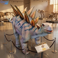 Stégosaure géant animatronique réaliste grandeur nature GECAI pour utilisation en centre commercial intérieur