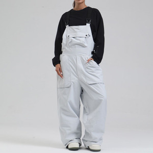 Traje de esquí de moda para hombre Pantalones de esquí de una sola tabla a prueba de viento impermeable pierna ancha suelta deportes al aire libre pantalones de esquí hombres <span class=keywords><strong>tirantes</strong></span> invierno - Product Image 6