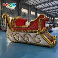 Grande luge gonflable géante de Père Noël pour la décoration de Noël et la promotion d'événements