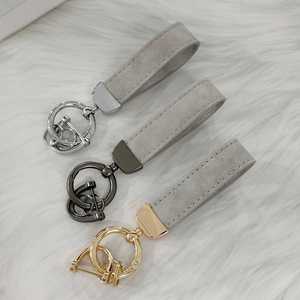 พวงกุญแจรถหนังนิ่มรูปตัวทีที่ถอดออกได้สุดสร้างสรรค์หัวเข็มขัดรูปเกือกม้าพิมพ์ยูวีอุปกรณ์เสริมกระเป๋าเทรนด์ส่วนบุคคลจี้ - Product Image 1