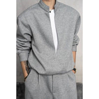 Nouvel ensemble deux pièces tendance pour homme, style coréen, col montant, pull ample et pantalon décontracté, collection Printemps-Automne 2026