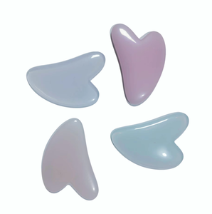 Productos de belleza en forma de corazón, herramientas para el cuidado de la piel, raspador facial de resina Gua Sha - Product Image 1