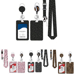 Manufacturer of leopard print epoxy rotating pull <b>buckle</b> 360-degree badge/ID card roll <b>clip</b> with detachable webbing lanyard - Product Image 5
