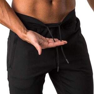 Pantalon de jogging décontracté pour homme, coupe ajustée, taille mi-haute, devant plissé, cordon de serrage à la cheville, extensible dans les quatre sens, uni, teint, respirant - Product Image 5