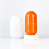 Pot en plastique brillant en forme de capsule en PET, couleur personnalisée, qualité alimentaire, pour l'emballage de comprimés et pilules de santé