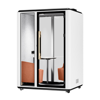 Cabine insonorisée mobile moderne avec design modulaire, pod de réunion acoustique privé pour hôtel, incluant un canapé et un bureau