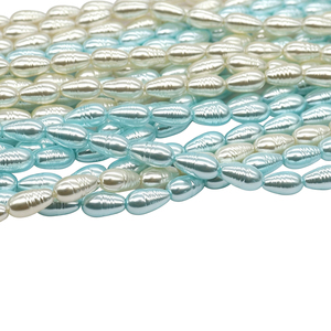 Cuentas de vidrio premium con núcleo pesado, forma Petite Marquise, color Azul Glaciar y Blanco Marfil, con textura de hilo, para DIY estilo Mermaidcore - Product Image 3