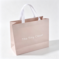 Sac en papier recyclé de luxe de haute qualité, nouveau design, impression de logo personnalisée pour les cadeaux, l'emballage des vêtements