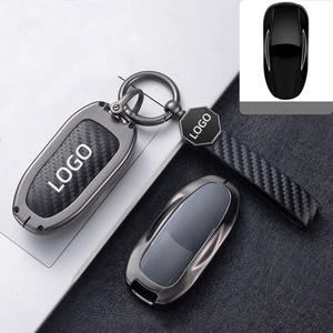 Housse de porte-clés de voiture en fibre de carbone en alliage de zinc DM pour accessoires de porte-clés <span class=keywords><strong>Tesla</strong></span> <span class=keywords><strong>Model</strong></span> <span class=keywords><strong>3</strong></span> <span class=keywords><strong>Model</strong></span> S - Product Image 1