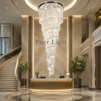Lustre en cristal personnalisé en spirale rotative pour escalier d'hôtel, lampe suspendue verticale en cascade de cristal de luxe pour hôtel et villa