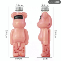 Design de mode 400ml 500ml 700ml bouteilles de boisson en forme d'ours bouchon en aluminium emballage en plastique PET pour jus eau lait bouteille de thé