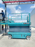 Elektrische Selbstfahrende Scherenhebebühne Personenaufzug 200-2000KG Tragfähigkeit 3-20M Hubhöhe für Bau und Lager